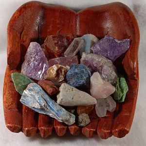 Gems, Ruby And Minerals In Wooden Cupped Hands
